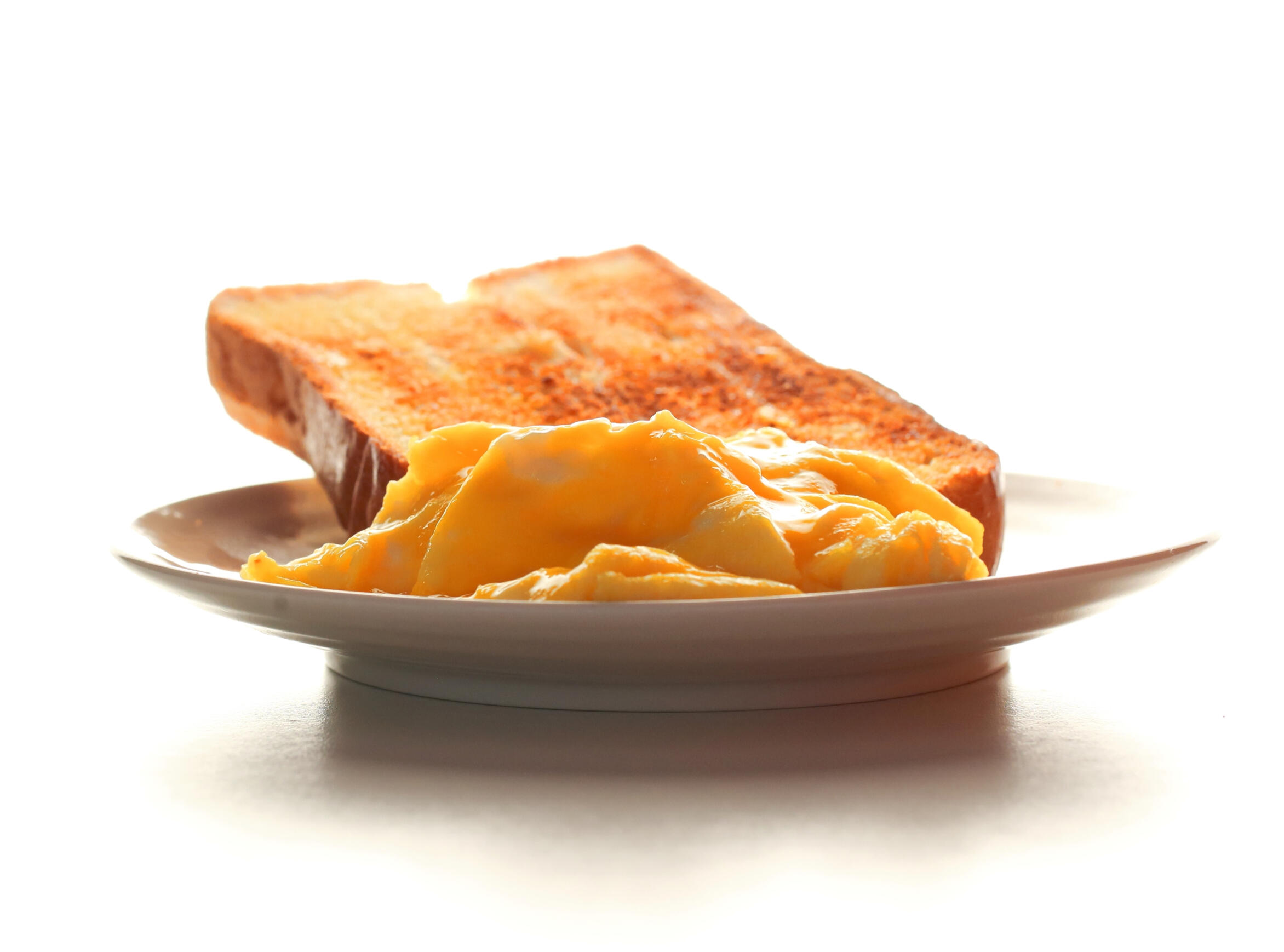 UK South East food photography - scrambled egg toast in bright white UK South East food photography - Scrambled egg toast in bright white