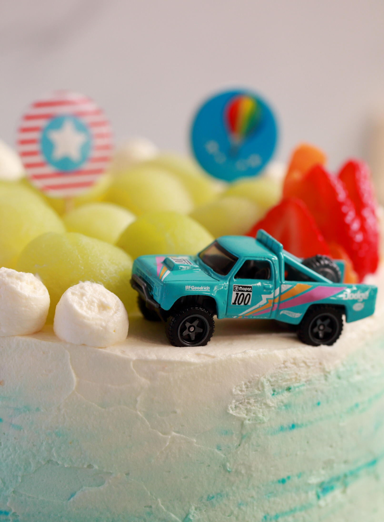 UK South East food photography - Toddler birthday cake with fruit and toy car theme UK South East food photography - Toddler birthday cake with fruit and toy car theme